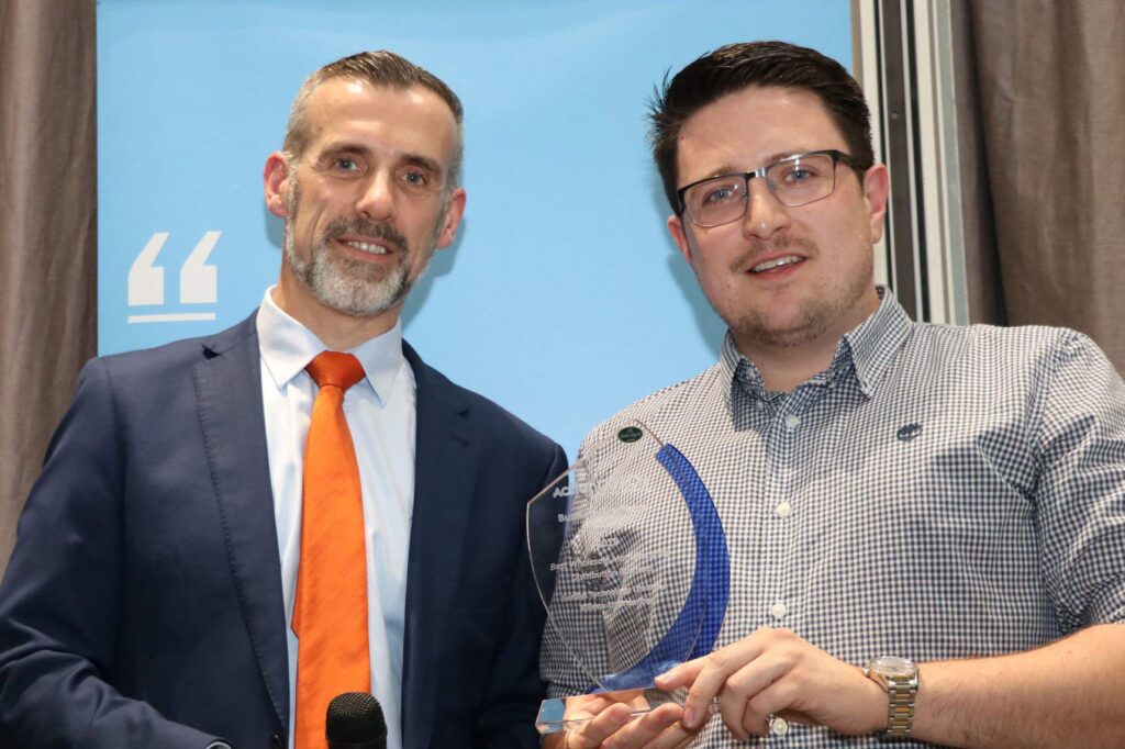 Actioncoach Ireland & Ben Killeen receiving award